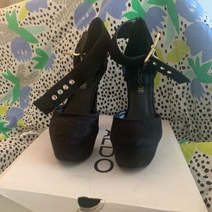 All black suede buckled heel